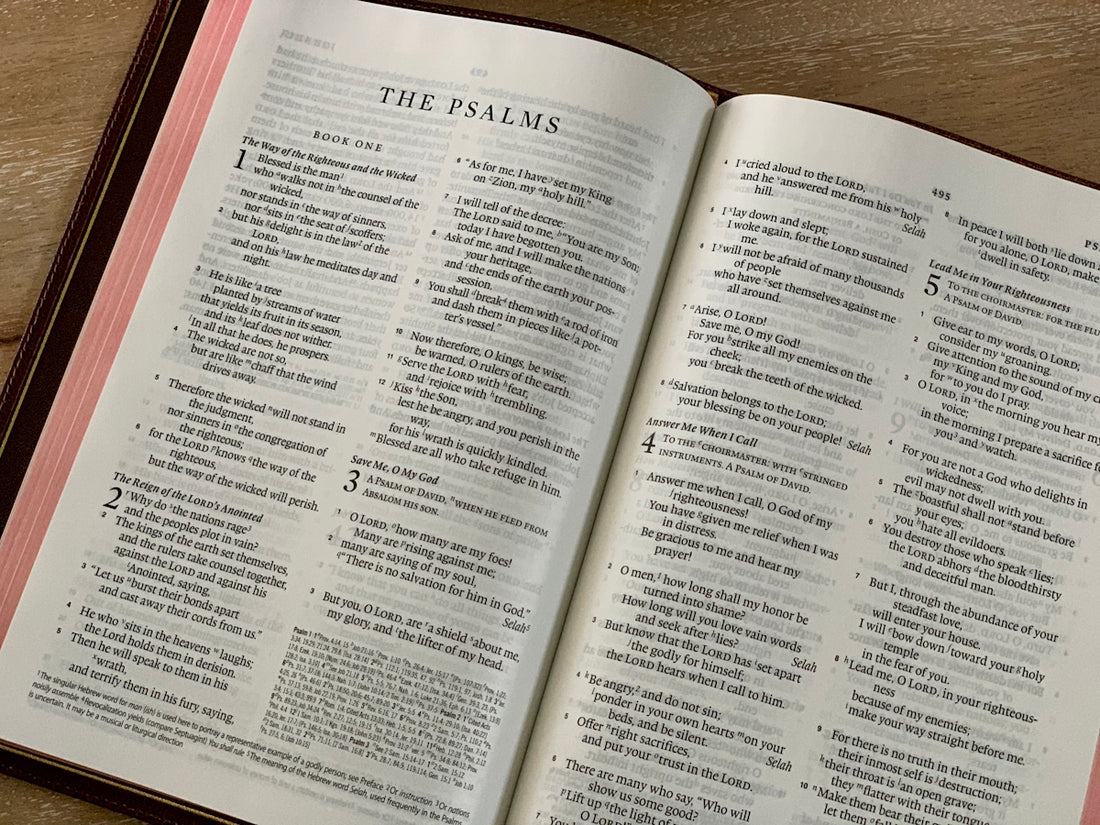 white book page on brown wooden table