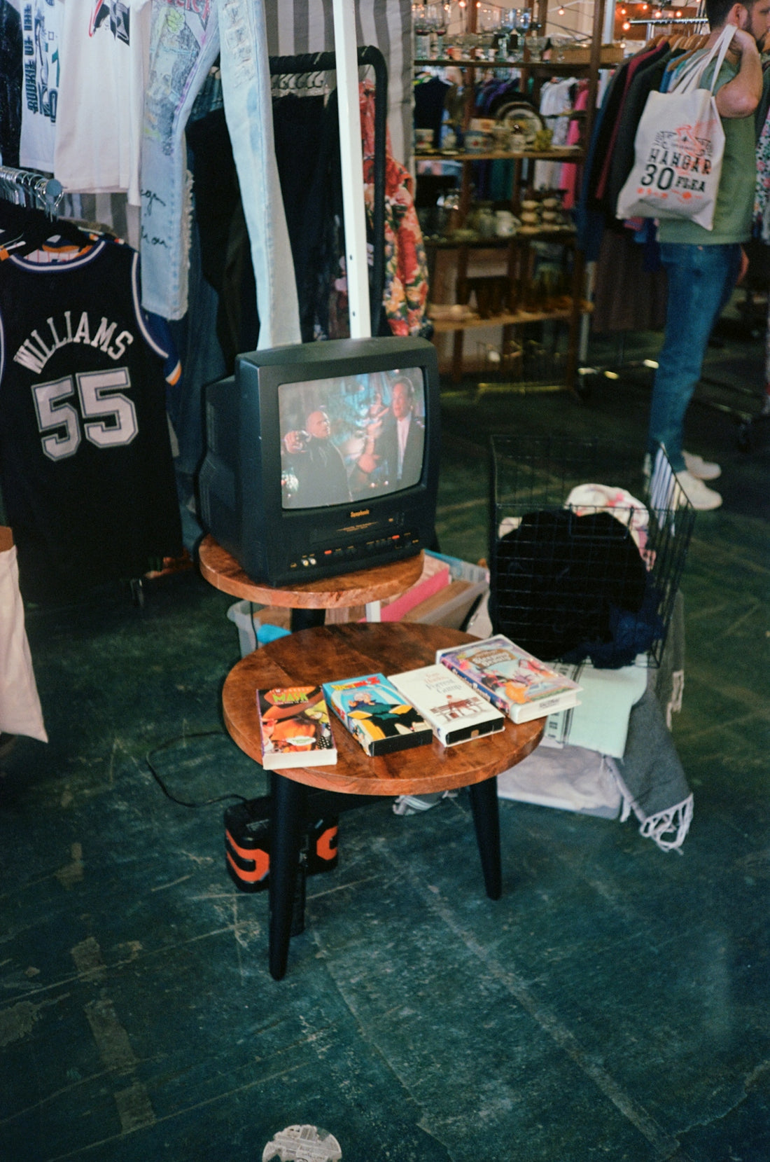a television sitting on top of a wooden table